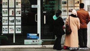 Looking in an estate agent's window