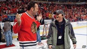 Vince Vaughn (l) and Ron Howard on the set of The Dilemma