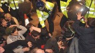 Protesters clash with police near the Royal Bank of Scotland