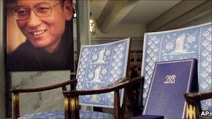 A picture of Liu Xiaobo, next to his empty chair at the Nobel Peace Prize ceremony on 10 December 2010