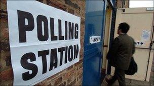 A man walks into a polling station