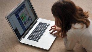 Generic photo of young girl using computer