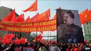 Communists marching with portrait of Stalin in Moscow, 1 May 10