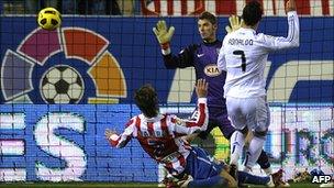 Cristiano Ronaldo scores the only goal of the Atletico Madrid v Real Madrid game