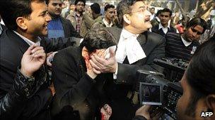 Dr Rajesh Talwar after being attacked outside a court near Delhi