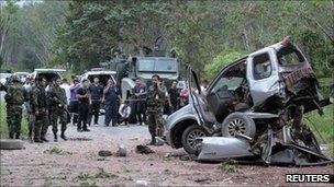 Security personnel at the site of the attack in Yala on 25 January 2010