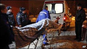 A blast victim is taken to hospital, 24 Jan 11