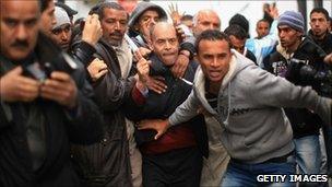 Protesters near the prime minister's resident in Tunis