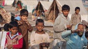 Children at a camp for flood victims along the road from Dadu, in Pakistan's Sindh province