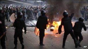 Egyptian riot police clash with anti-government activists in Cairo, Egypt