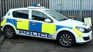 Parked, decommissioned police car