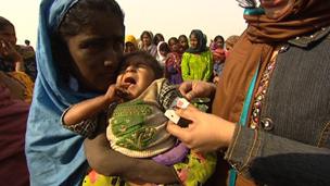 Checking children for malnutrition