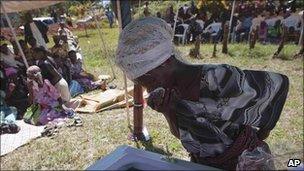 A mourner at the funeral of the Ugandan gay activist, David Kato