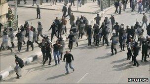Demonstrators clash with riot police in Cairo. Photo: 28 January 2011