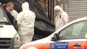 Police at the scene of the stabbing