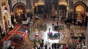 Honour guards stand by the coffin of former Russian president Boris Yeltsin inside Christ the Saviour Cathedral, during a farewell ceremony, Moscow, Wednesday, April 25, 2007, with Yeltsin's family members behind the coffin.