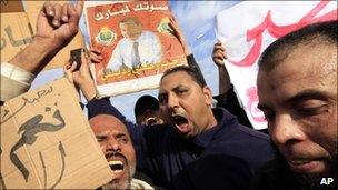 Egyptian pro-Mubarak supporters shout slogans during a march in Cairo, Egypt, 1 February 2011