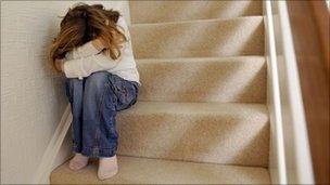 Child sitting on stairs