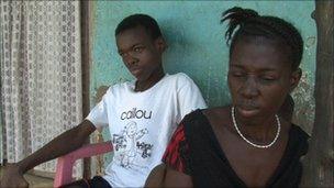 Saidu, left, and his mother, right