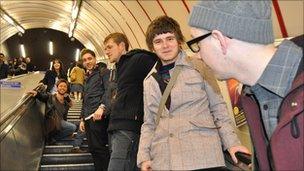 Emma Cherry, Chris Athorne, Stefan Vincent, Chris Francis, Henry Homesweet and MC Truth on an escalator