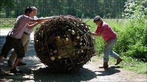 Moving a stone in a wicker construction