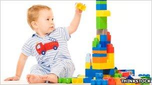 boy building tower