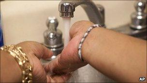 Woman washing hands