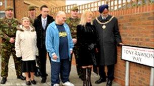 Private Tony Rawson's grandmother Olive Rawson, his parents, Ann Williams and Alan Rawson and with mayor Nirmal Singh Gill and soldiers