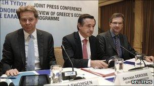 The ECB's Klaus Masuch (R), the EU's Servaas Deroose (C) and the IMF's Poul Thomsen