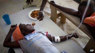 Janika Faneus, receiving treatment for cholera at a MSF, Doctors Without Borders cholera clinic in Saint-Marc, Haiti