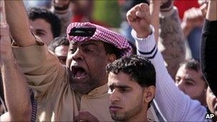 Demonstrators chant in the village of Duraz, outside the capital of Bahrain, Manama, 14 February 2011.