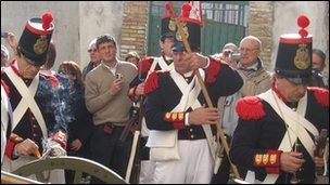 Gaeta locals watch soldiers prepare for parade