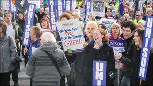 Protestors outside the civic centre with placards