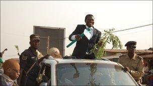 Norbert Mao with security guards