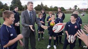 Justice Secretary Kenny MacAskill with young rugby players