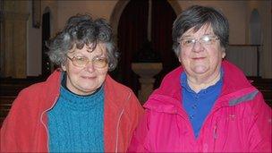 Jo Osment and Ann Hyland inside St Lawrence's Church, Folke