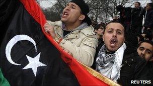 Demonstrators protest against Libya's Muammar Gaddafi outside the Libyan Embassy in London, 20 February 2011