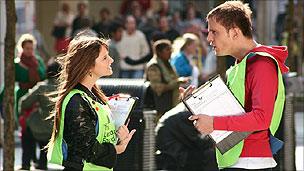 Charity fundraisers in a scene from How Not To Live Your Life