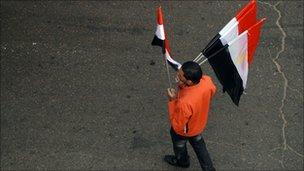 Man selling Egyptian flags