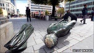 Fallen statue in Christchurch after the earthquake