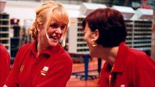 Royal Mail workers laughing