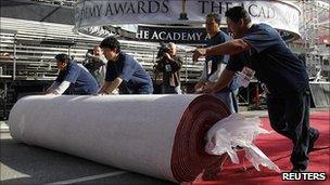 Staff rolling out the red carpet ready for the Oscars