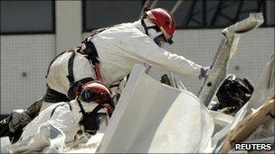 British search-and-rescue workers in Christchurch