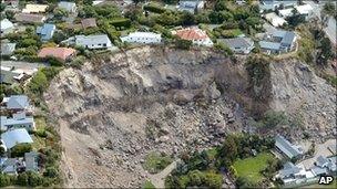 Giant rocks at the site of a quake-triggered landslide in Christchurch, New Zealand