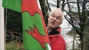 Eddie Butler with the Welsh flag