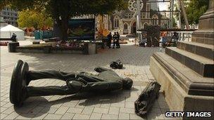 The fallen statue of John Robert Godley in Cathedral Square, Christchurch, on Tuesday