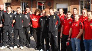 Stephanie Booth with Wrexham FC and Celtic Crusaders players in Wrexham