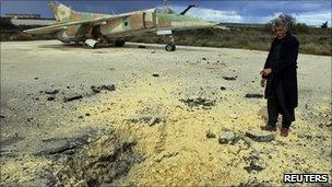 Damage to a Libyan runway in the eastern town of Abrak, 24 February