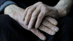 Close up of elderly person's hands