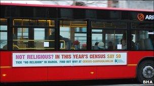 A bus featuring a poster by the British Humanist Association